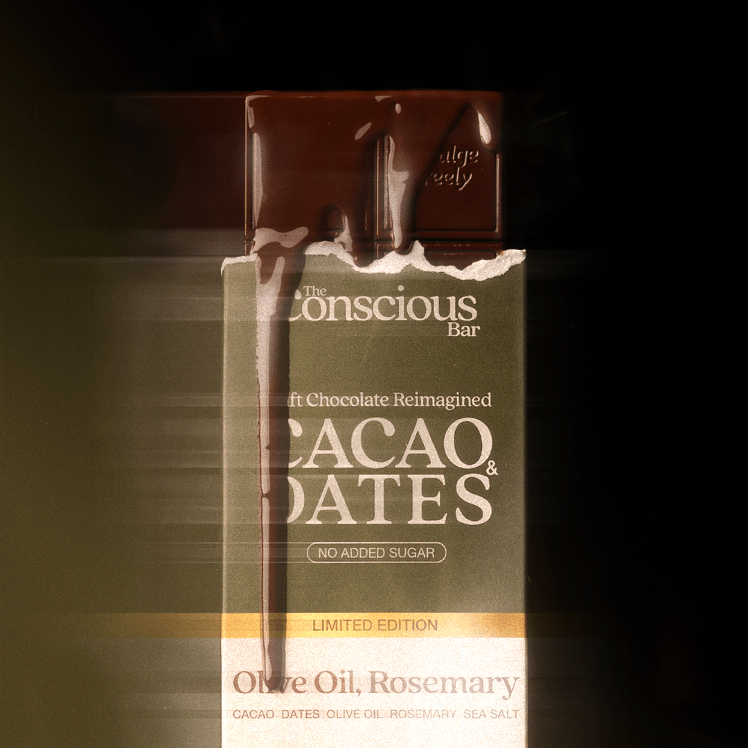 Conscious Bar chocolate bar packaging with cacao and dates flavor on a dark background