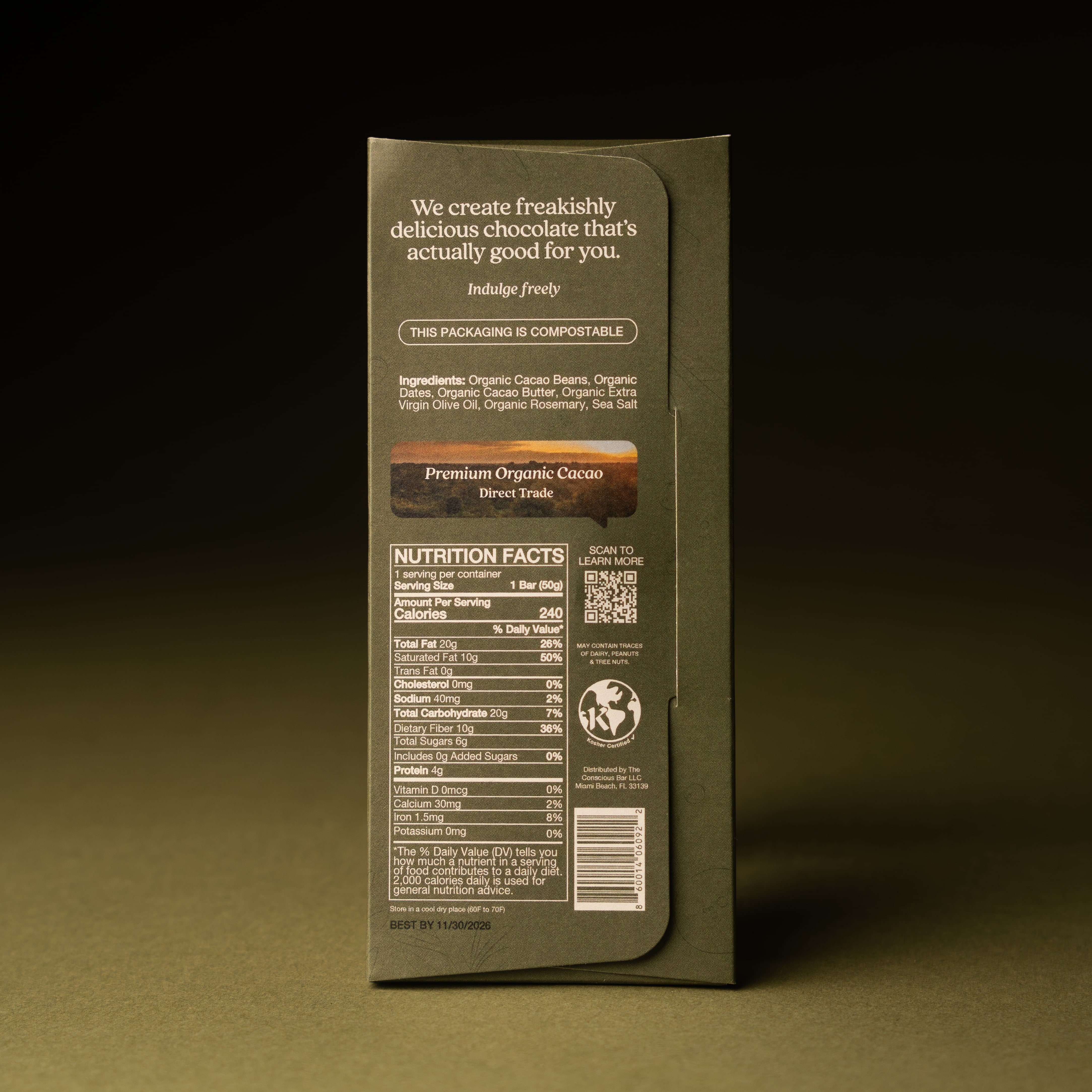 Back of a chocolate bar packaging with text and nutrition facts on a dark background